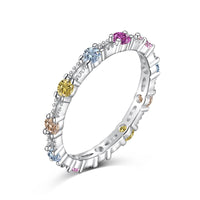 [Globe Jewelers] Funkelnder, farbenfroher Tennisring mit rundem Schliff